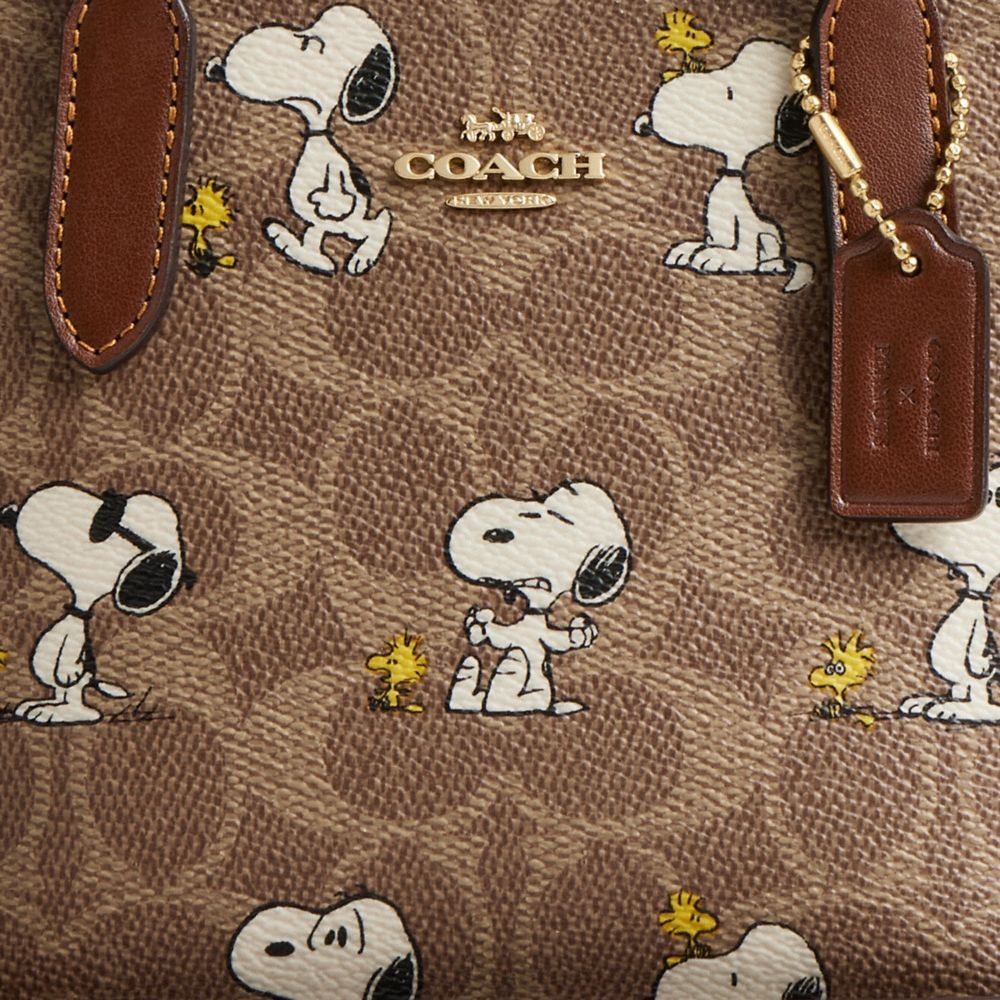COACH®,Coach X Peanuts City Mini Tote Bag In Signature Canvas With Snoopy Print,,Closer View