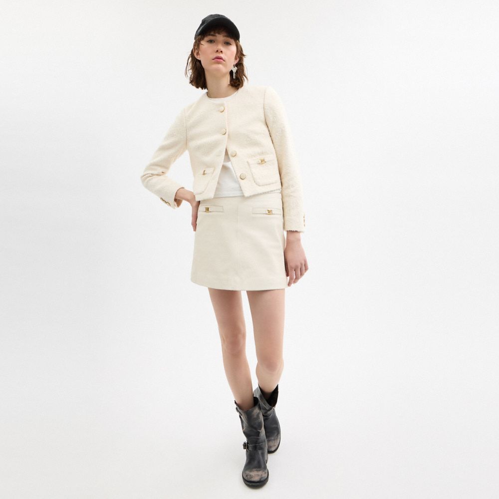 Coach In Cream