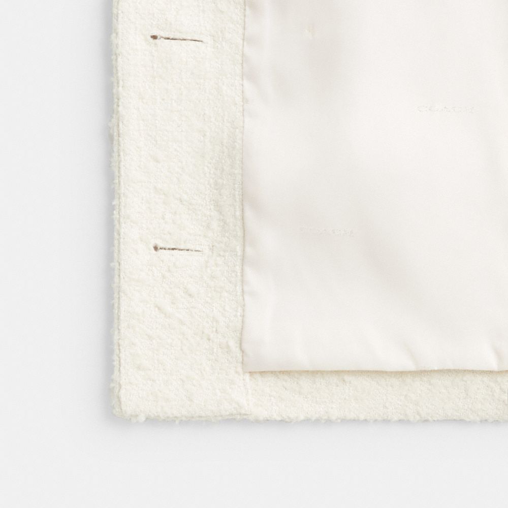 Coach In Cream
