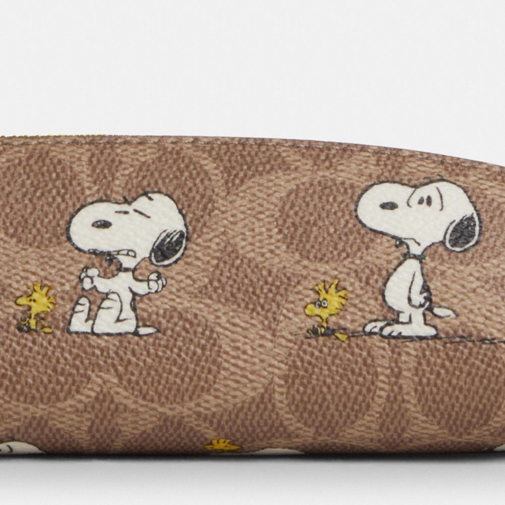 COACH®,Coach X Peanuts Pencil Case In Signature Canvas With Snoopy Print,,Closer View