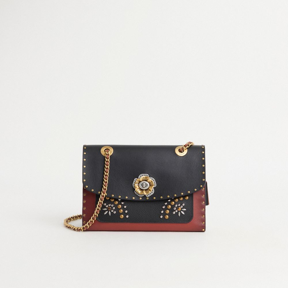 Coach parker in signature canvas with rivets and snakeskin detail sale