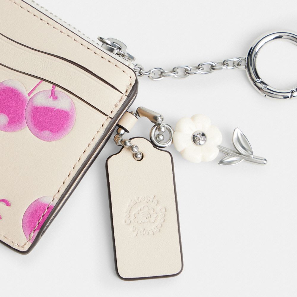 COACH®,Coachtopia | The Summer I Turned Pretty™ Wavy Zip Card Case In Regenerative Leather With Cherry Print,