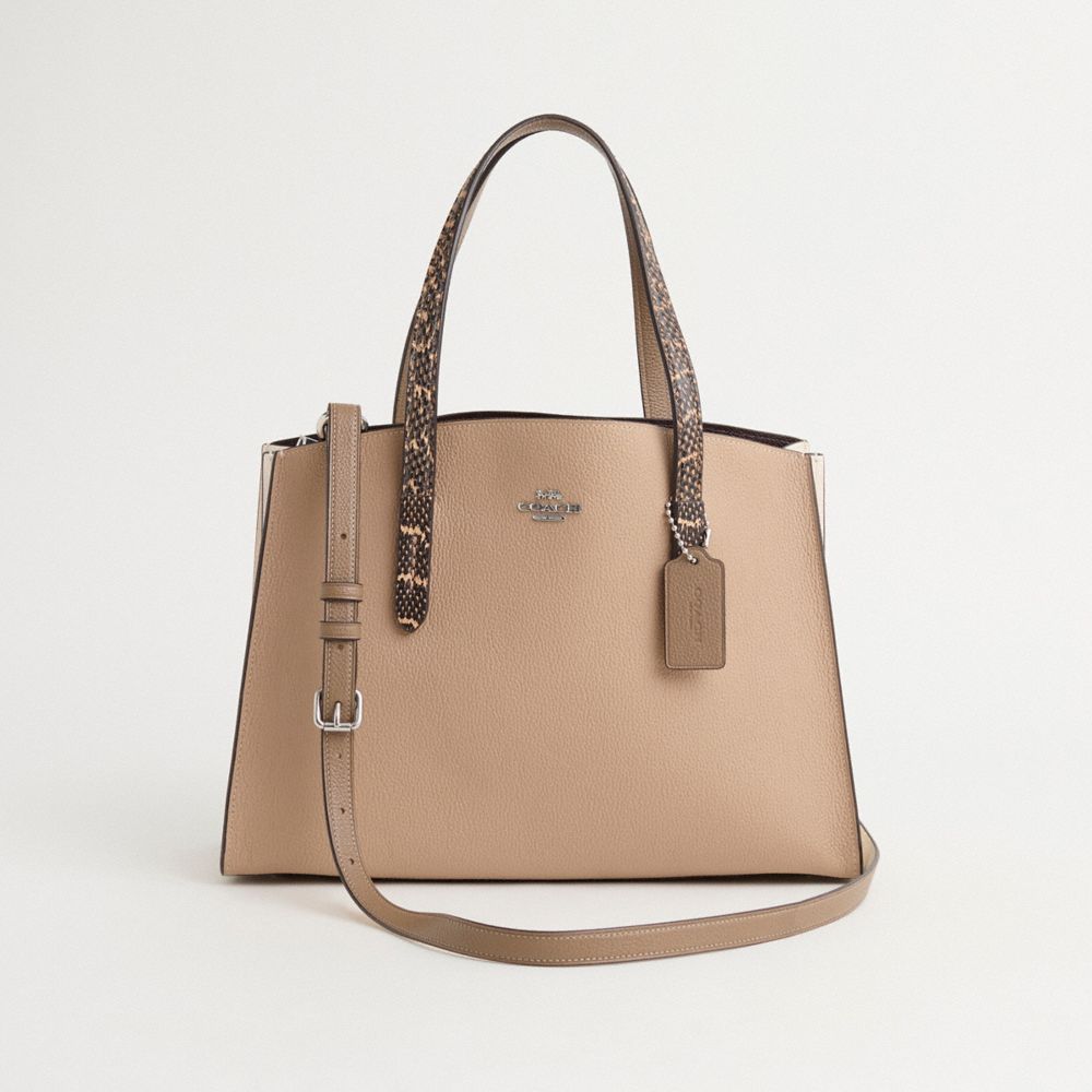 Coach bags charlie carryall online