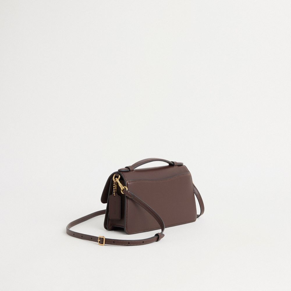 COACH®,Restored Juno Bag,Leather,Fabric,Satchel,Logo,Metal,Compact,Sustainable,Lined,Adjustable,Brass,Casual,Brown,Angle View