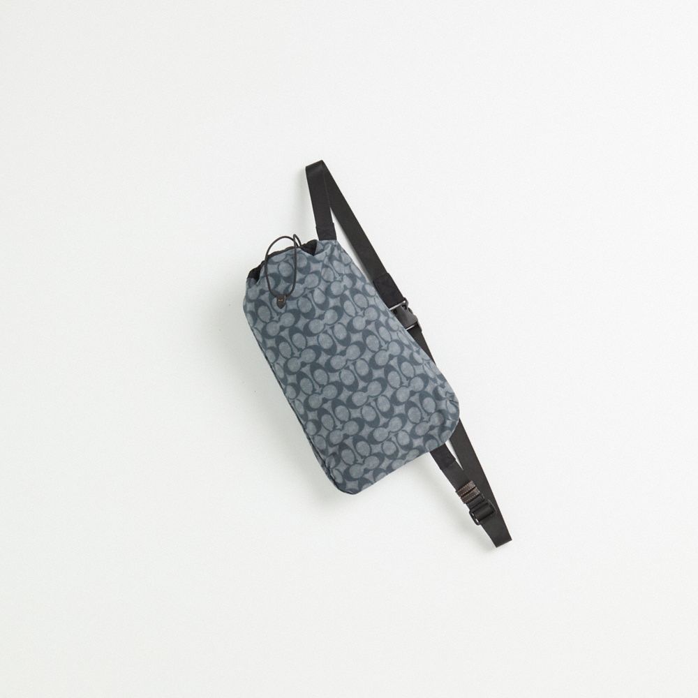 COACH®,Restored Packable Windbreaker,Nylon,Polyester,Windbreaker,Drawstring,Packable,Eco-Friendly,Ripstop,Wind Resistant,W...,Gray,Angle View