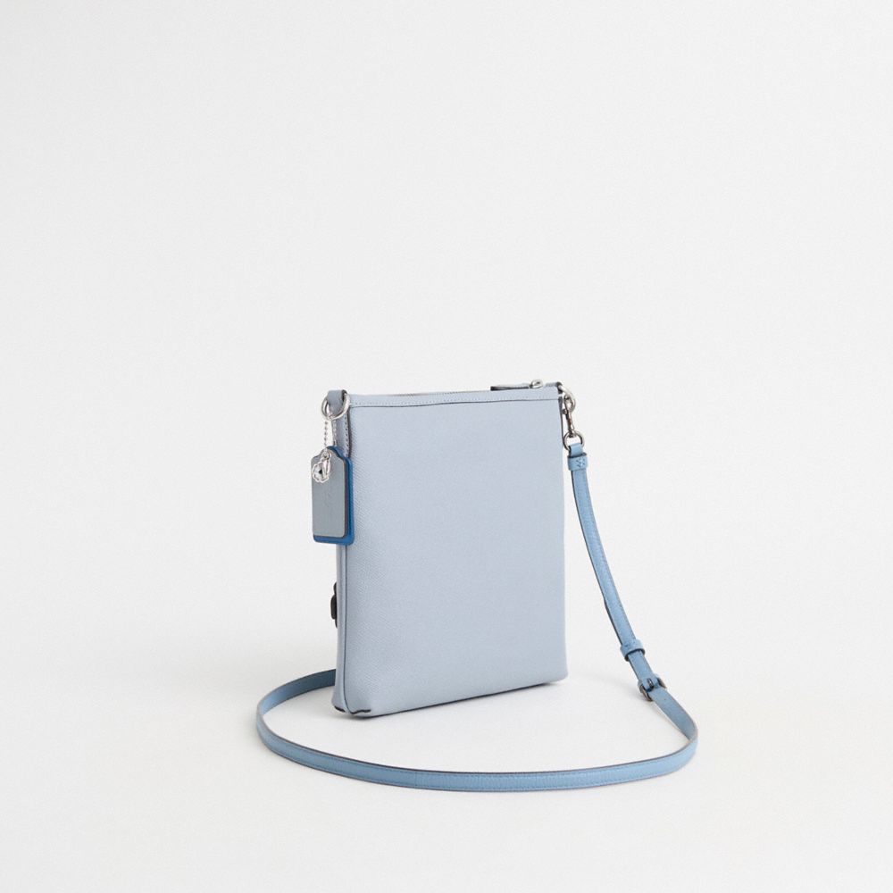COACH®,Upcrafted Kitt Messenger Crossbody Bag,Leather,Crossbody,Logo,Metal,Applique,Floral Embellishment,Adjustable,Silver...,Turquoise,Angle View
