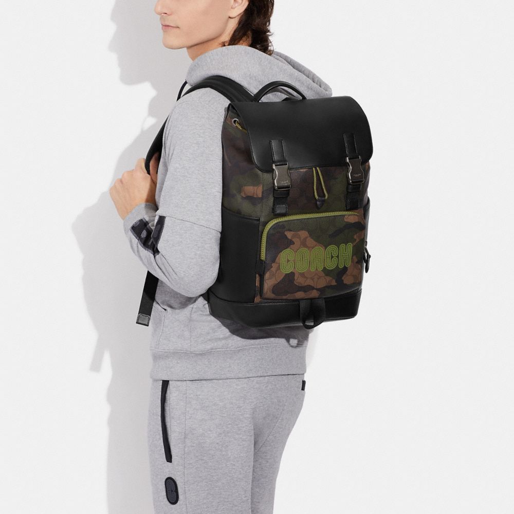 COACH®,Track Backpack In Signature Canvas With Camo Print And Coach Patch,,Detail View