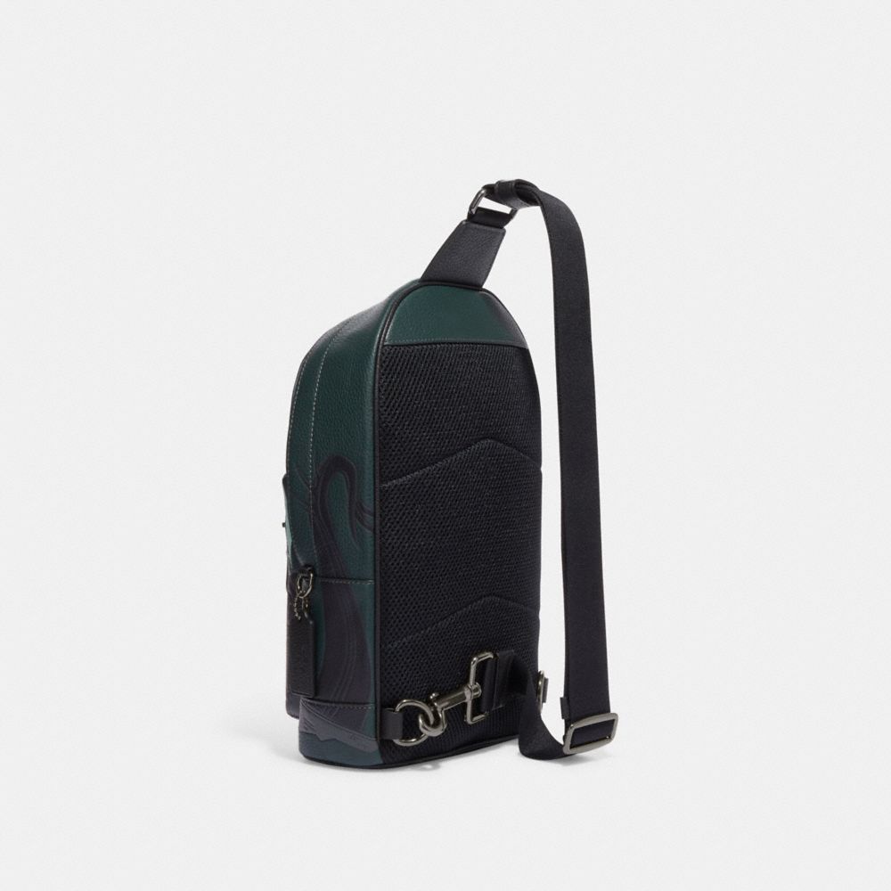 COACH®  Disney X Coach West Backpack With Maleficent Dragon Motif