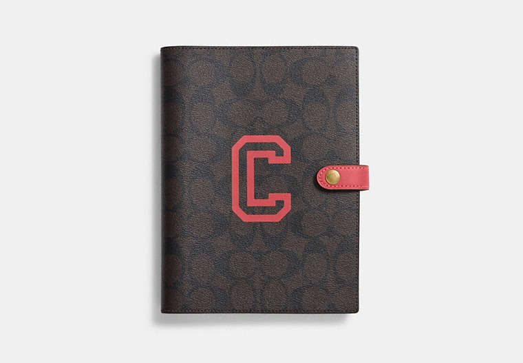 COACH®,NOTEBOOK IN SIGNATURE CANVAS WITH VARSITY MOTIF,Im/Brown Watermelon,Front View