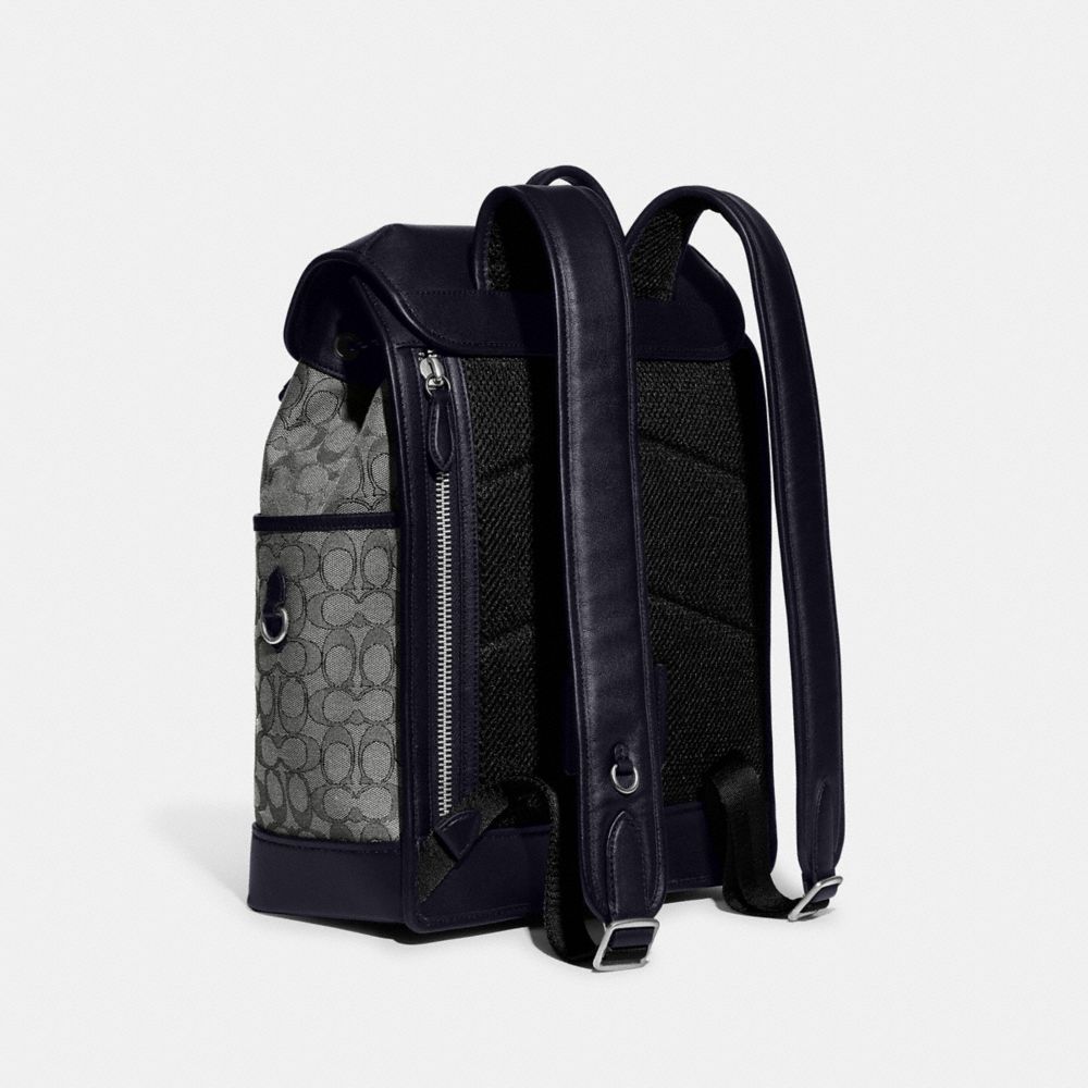 COACH®,LEAGUE FLAP BACKPACK IN SIGNATURE JACQUARD,Signature Jacquard,X-Large,Midnight Navy,Angle View