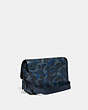 COACH®,LEAGUE MESSENGER BAG WITH CAMO PRINT,Polished Pebble Leather,Medium,Blue/Midnight Navy,Angle View