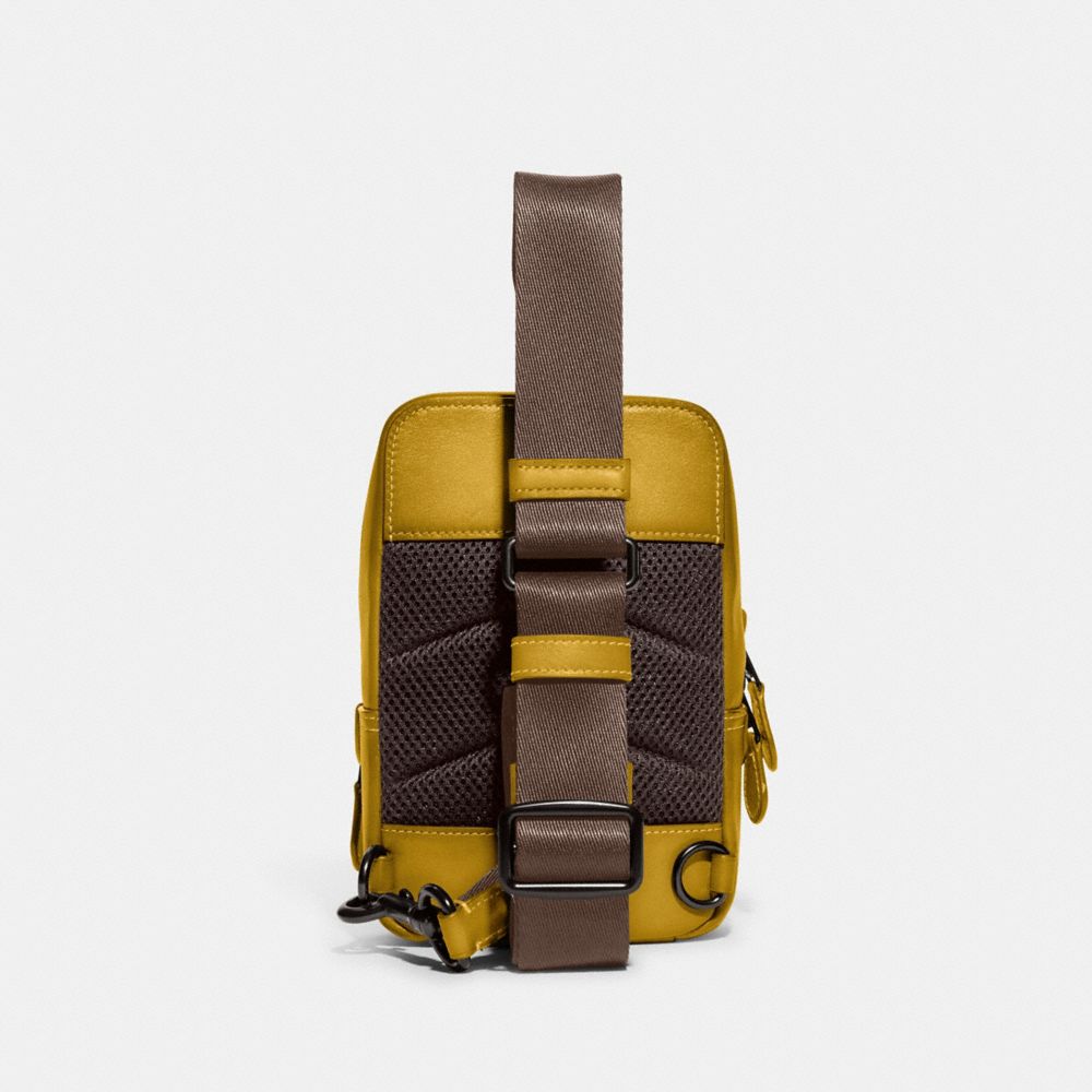 COACH®: Gotham Sling Pack 13 In Signature Canvas