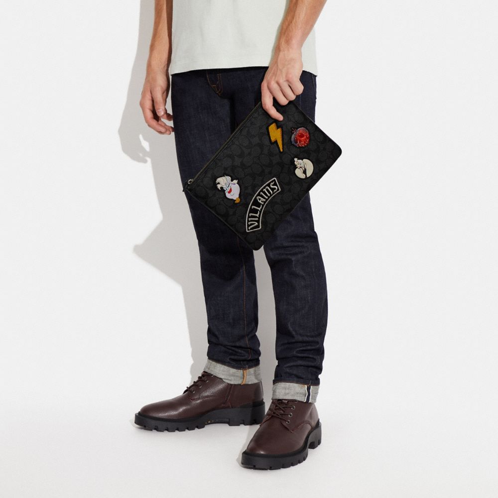 COACH®,Disney X Coach Large Pouch In Signature Canvas With Patches,,Detail View