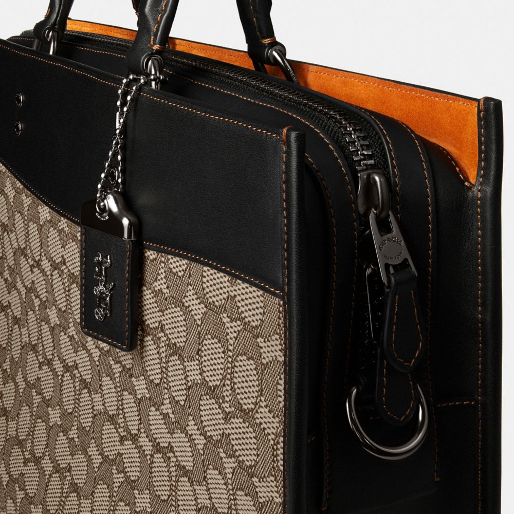 signature coach laptop bag