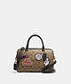 COACH®,DISNEY X COACH ROWAN SATCHEL BAG IN SIGNATURE CANVAS WITH PATCHES,Signature Coated Canvas,Medium,Gold/Khaki Multi,Front View