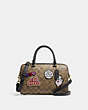 COACH®,DISNEY X COACH ROWAN SATCHEL IN SIGNATURE CANVAS WITH PATCHES,Signature Coated Canvas,Medium,Gold/Khaki Multi,Front View