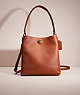 COACH®,RESTORED CHARLIE BUCKET BAG,Polished Pebble Leather,Large,Gold/1941 Saddle,Front View