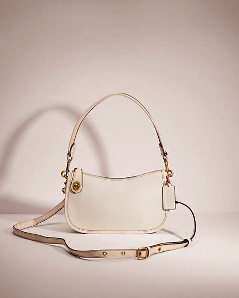 COACH®,RESTORED SWINGER BAG,Glovetanned Leather,Medium,Brass/Chalk,Front View