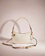 COACH®,RESTORED SWINGER BAG,Glovetanned Leather,Medium,Brass/Chalk,Front View
