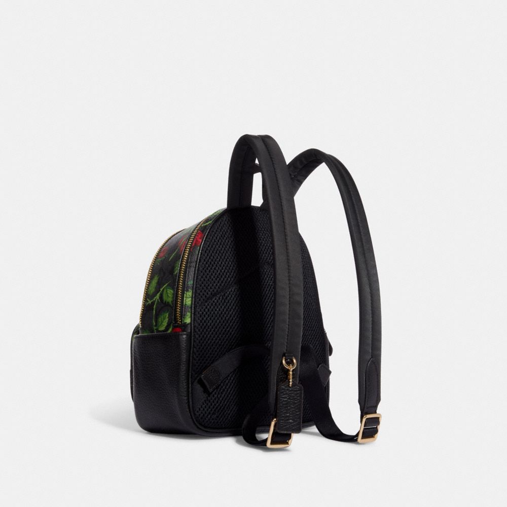 COACH®,MINI COURT BACKPACK IN SIGNATURE CANVAS WITH FAIRYTALE ROSE PRINT,Signature Coated Canvas,Medium,Im/Graphite/Red Multi,Angle View