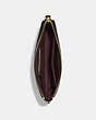 COACH®,DISNEY X COACH CORNER ZIP WRISTLET WITH EVIL QUEEN MOTIF,Refined Pebble Leather,Mini,Gold/Black Multi,Inside View,Top View