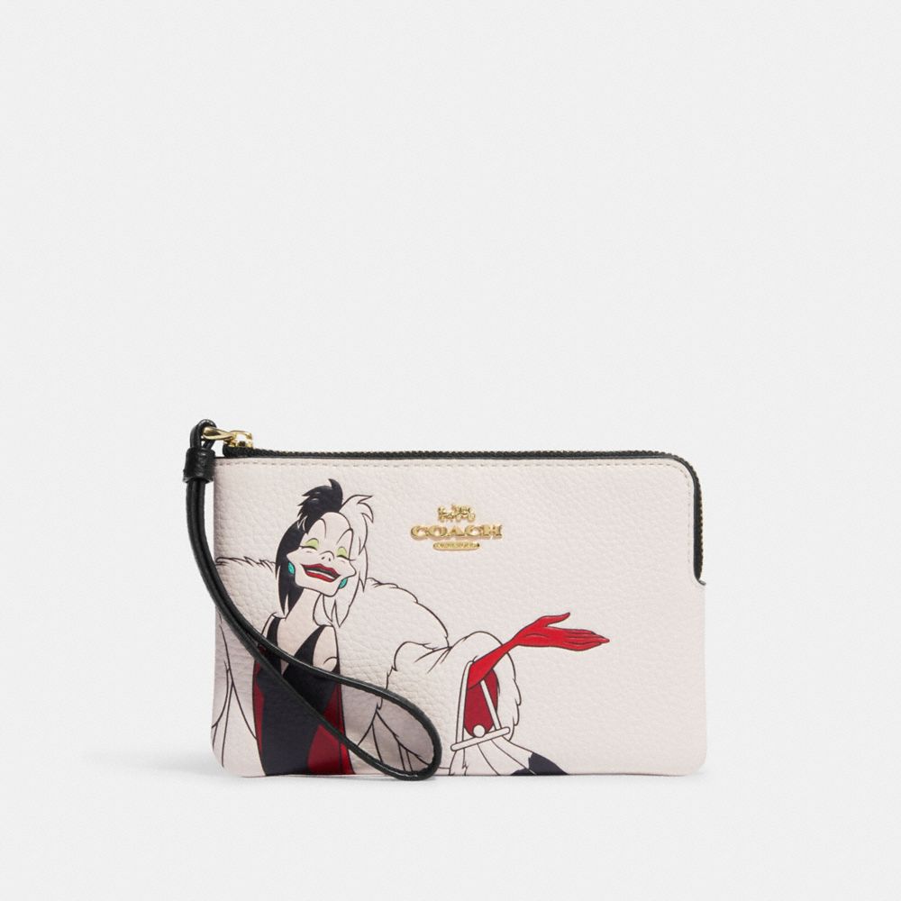 COACH® | Disney X Coach Corner Zip Wristlet With Cruella Motif