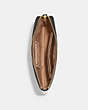 COACH®,DISNEY X COACH CORNER ZIP WRISTLET WITH CRUELLA MOTIF,Refined Pebble Leather,Mini,Gold/Chalk Multi,Inside View,Top View