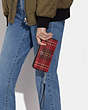 COACH®,LONG ZIP AROUND WALLET WITH TARTAN PLAID PRINT,Printed Coated Canvas,Mini,Silver/Red/Black Multi,Detail View