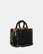COACH®,ROGUE 17 WITH RIVETS,Glovetanned Leather,Medium,Brass/Black,Angle View