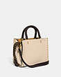 COACH®,ROGUE BAG 25 IN COLORBLOCK WITH RIVETS,Smooth Leather,Medium,Brass/Ivory Multi,Angle View