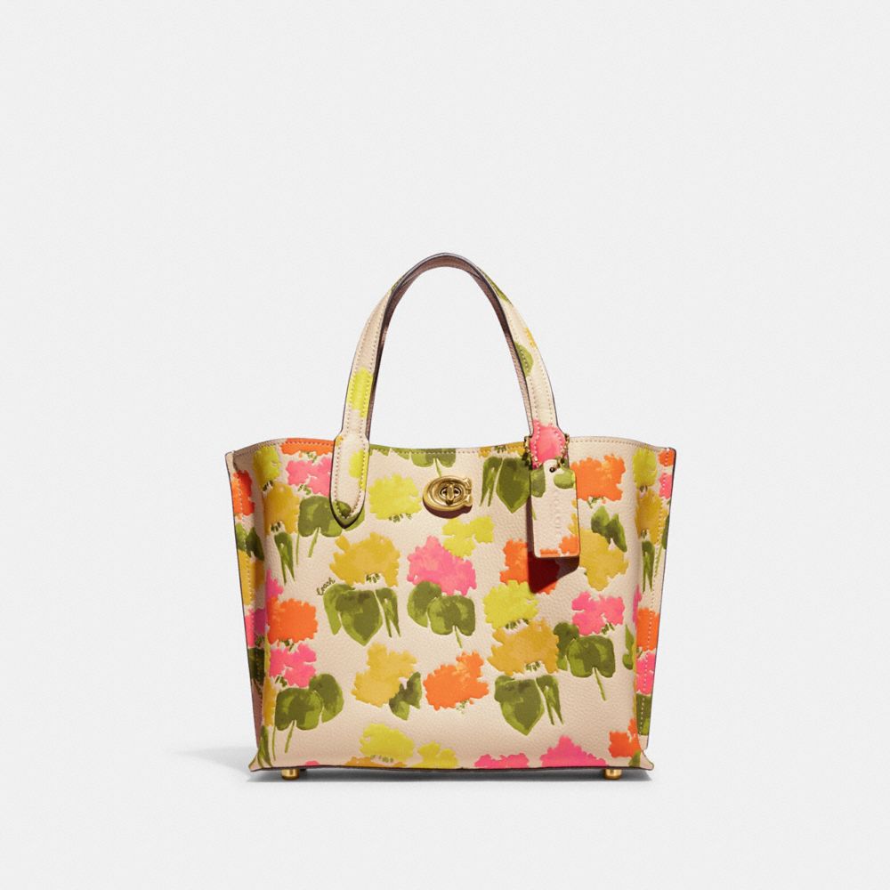 COACH®,WILLOW TOTE BAG 24 WITH FLORAL PRINT,Polished Pebble Leather,Medium,Brass/Multi,Front View image number 0
