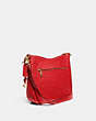 COACH®,CHAISE CROSSBODY BAG IN SIGNATURE LEATHER,Polished Pebble Leather,Medium,Brass/Sport Red,Angle View
