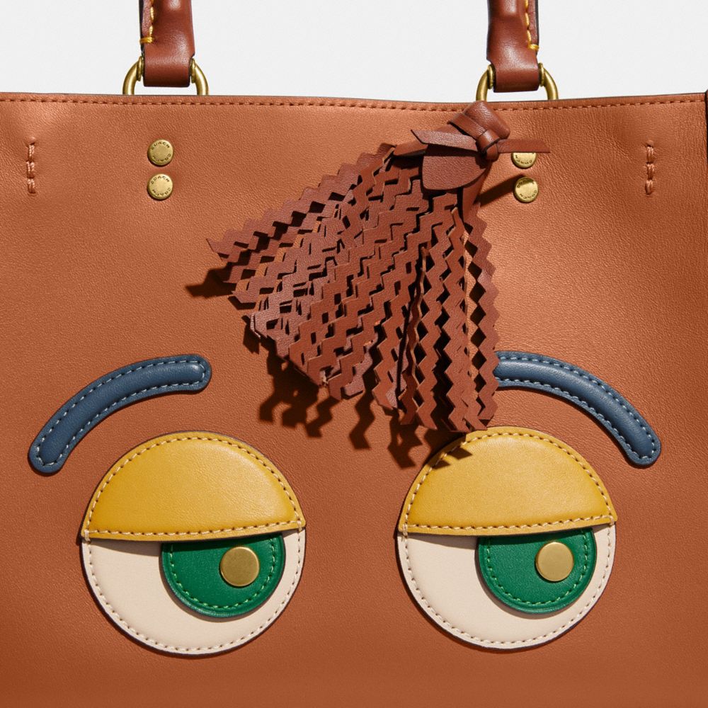 COACH コーチーズローグ25 シグネチャーテキスタイルジャガード