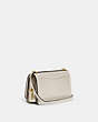 COACH®,BANDIT SHOULDER BAG,Luxe Refined Calf Leather,Small,Brass/Ivory,Angle View