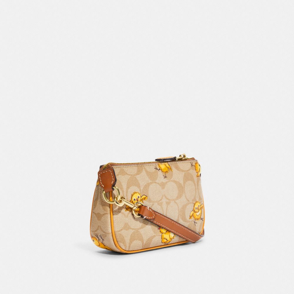 Coach Nolita 15 in Signature Canvas with Tossed Chick Print