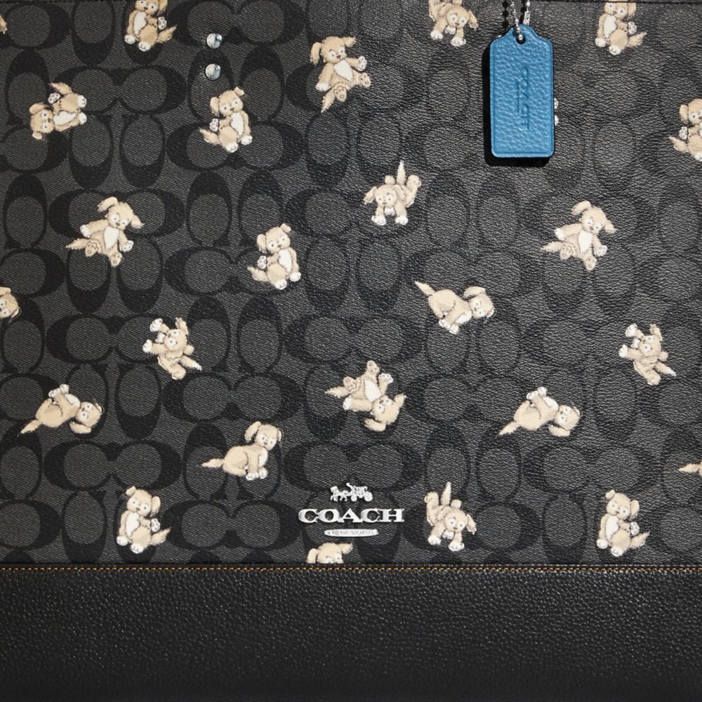 COACH®,Dempsey Tote Bag 40 In Signature Canvas With Happy Dog Print,,Detail View