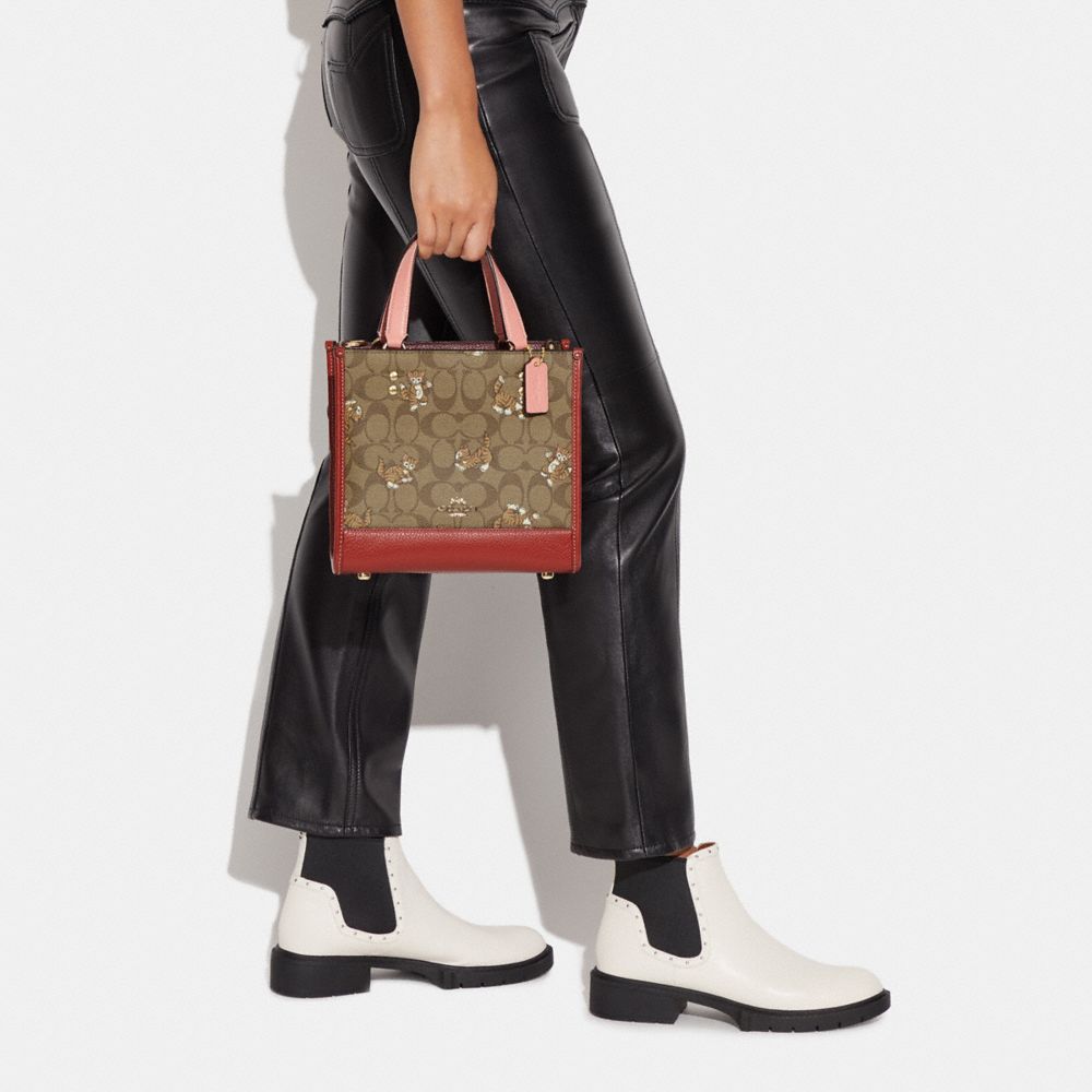 COACH®,Dempsey Tote Bag 22 In Signature Canvas With Dancing Kitten Print,,Detail View