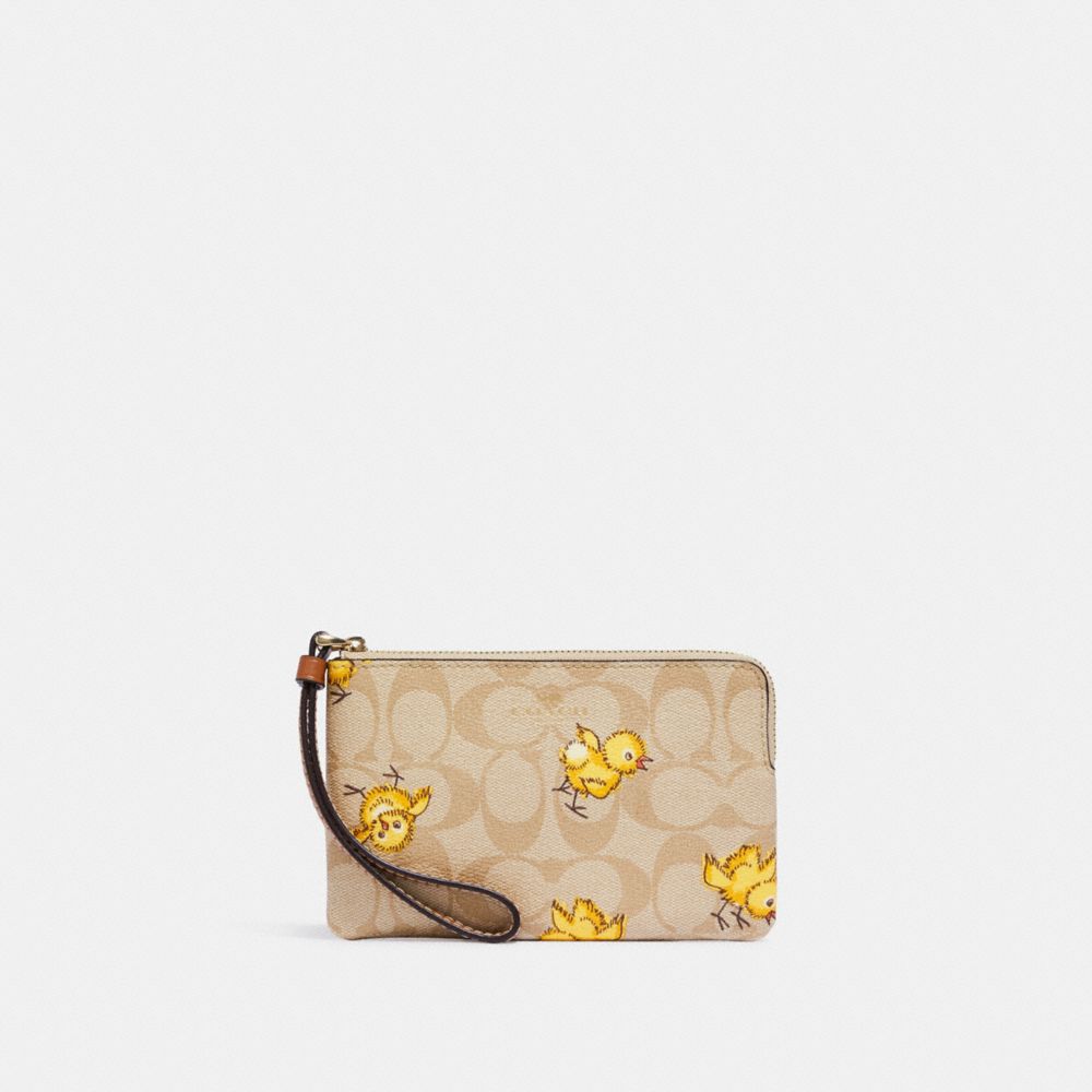 COACH®,CORNER ZIP WRISTLET IN SIGNATURE CANVAS WITH TOSSED CHICK PRINT,Mini,Gold/Light Khaki Multi,Front View