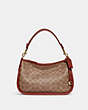 COACH®,CARY CROSSBODY IN SIGNATURE CANVAS,Signature Coated Canvas,Medium,Brass/Tan/Rust,Front View