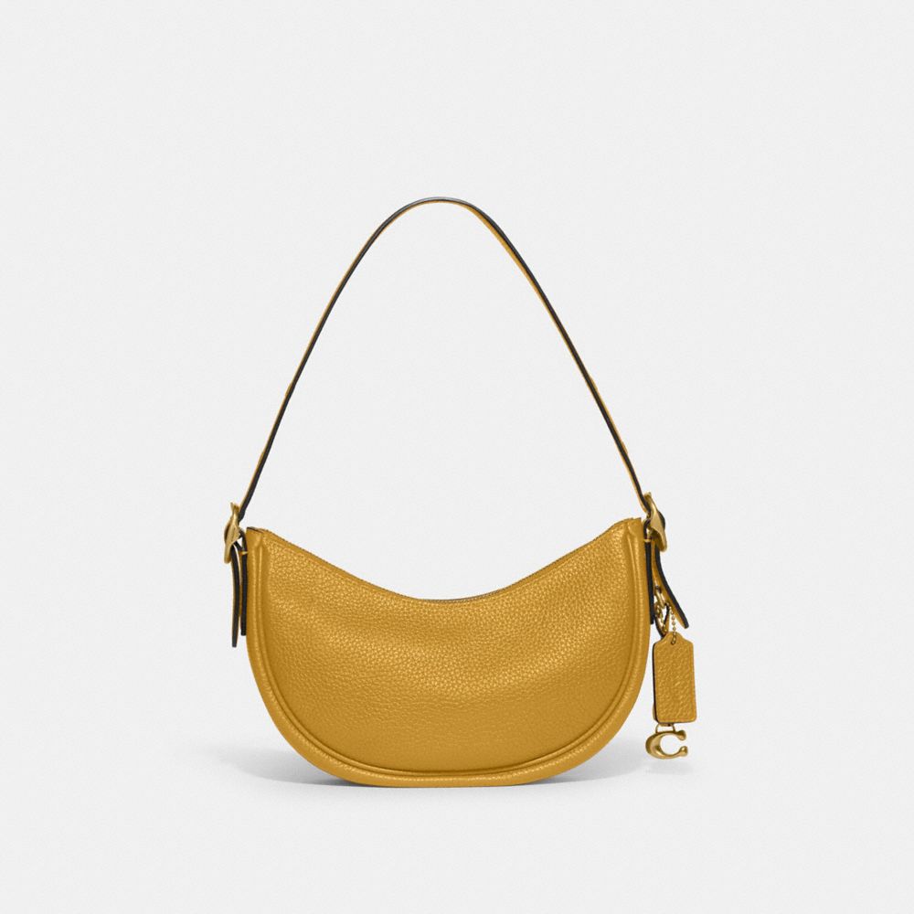 Coach discount yellow wristlet