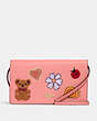 COACH®,ANNA FOLDOVER CLUTCH CROSSBODY WITH CREATURE PATCHES,Medium,Gold/Candy Pink Multi,Front View