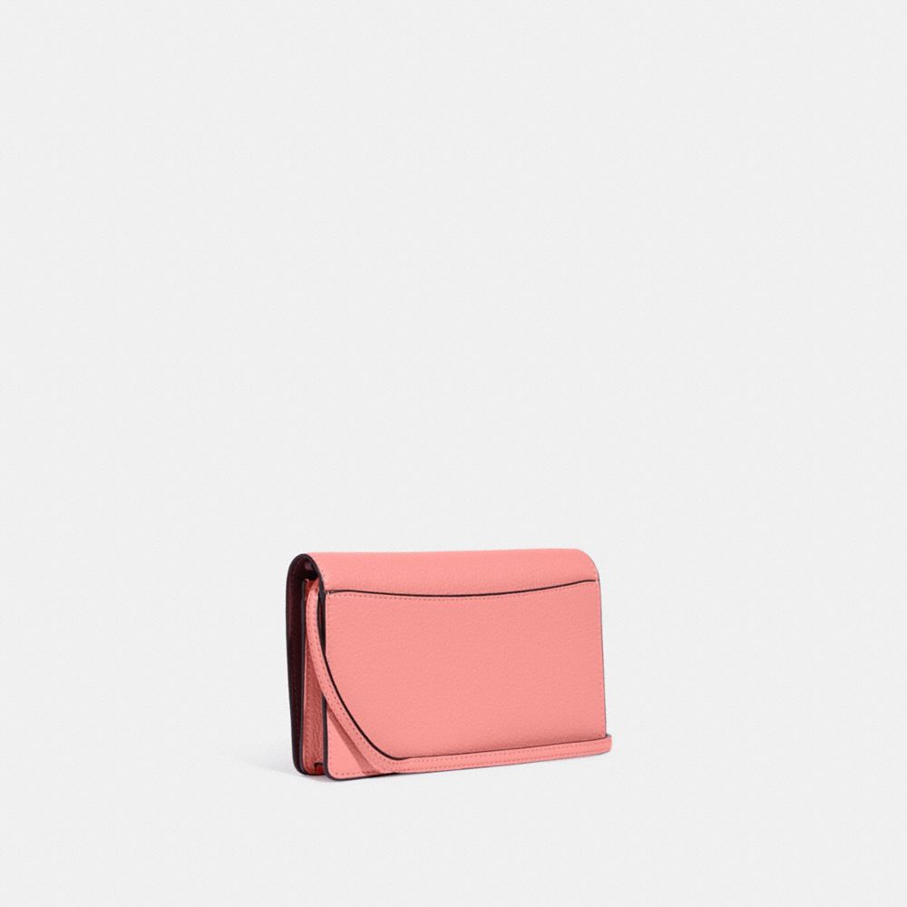 Coach pink clutch discount bag