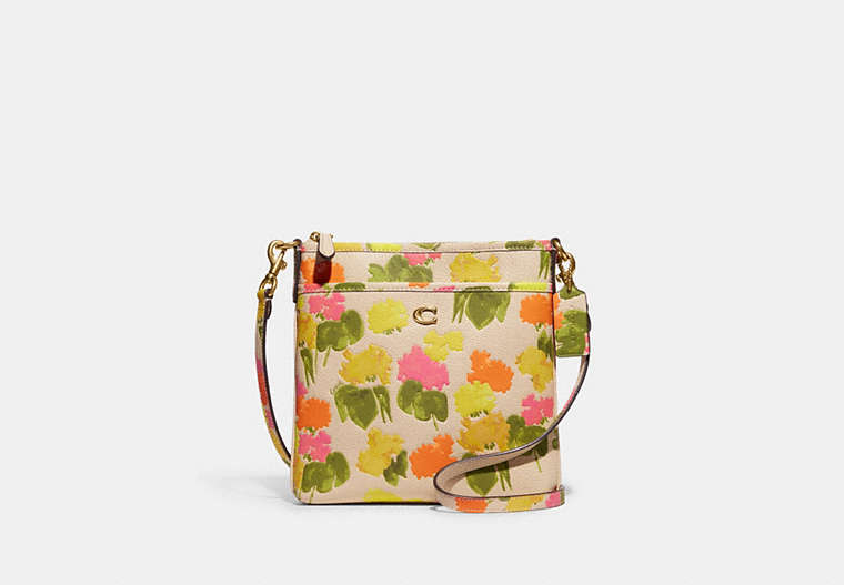 COACH®,KITT MESSENGER CROSSBODY BAG WITH FLORAL PRINT,Polished Pebble Leather,Small,Brass/Multi,Front View
