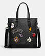 COACH®,DISNEY X COACH GRAHAM STRUCTURED TOTE IN SIGNATURE CANVAS WITH PATCHES,Large,Gunmetal/Charcoal/Black Multi,Front View