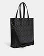 COACH®,DISNEY X COACH GRAHAM STRUCTURED TOTE IN SIGNATURE CANVAS WITH PATCHES,Large,Gunmetal/Charcoal/Black Multi,Angle View