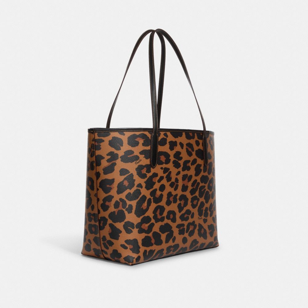 COACH®,CITY TOTE BAG WITH LEOPARD PRINT AND SIGNATURE CANVAS INTERIOR,Signature Canvas,X-Large,Silver/Light Saddle Multi,Angle View