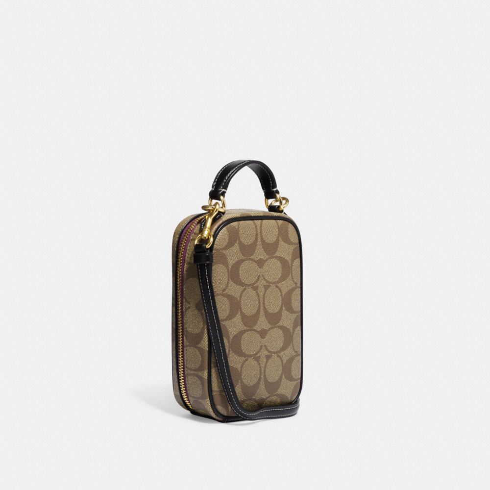 COACH®,Disney X Coach Eva Phone Crossbody In Signature Canvas With Patches,,Angle View