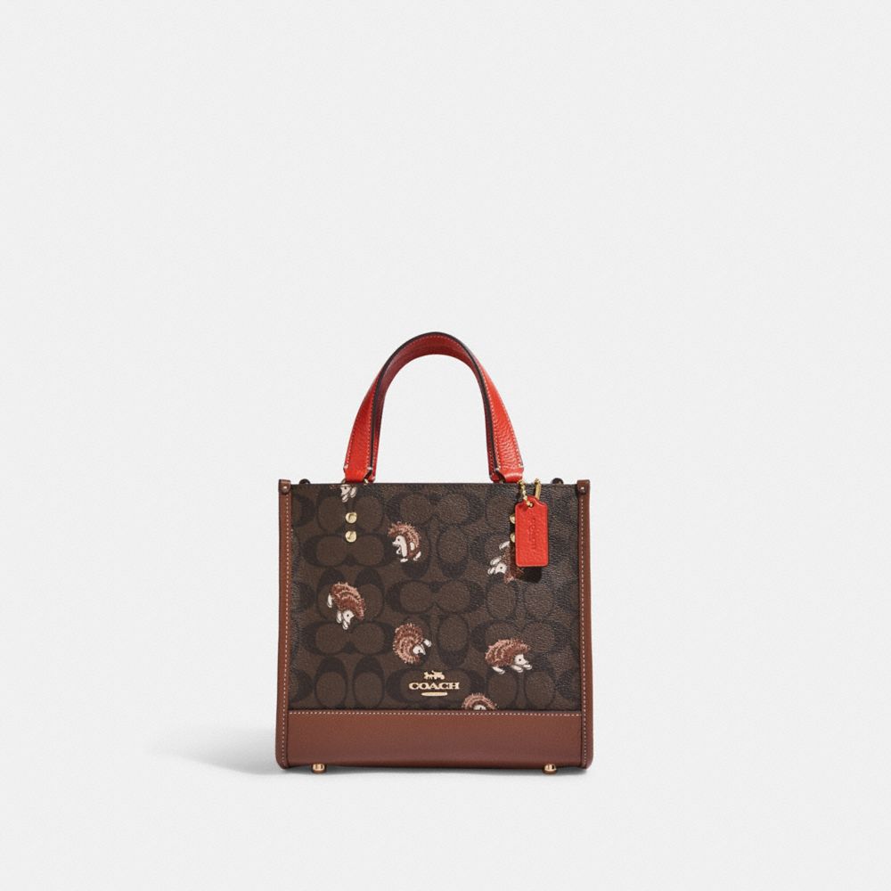 dempsey tote 22 in signature canvas with hedgehog print