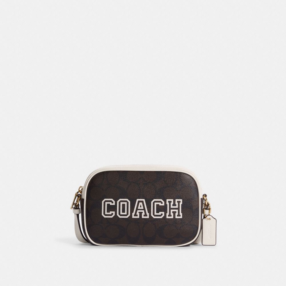 COACH®  Mini Jamie Camera Bag In Signature Canvas With Varsity Motif