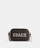 COACH®,MINI JAMIE CAMERA BAG IN SIGNATURE CANVAS WITH VARSITY MOTIF,Small,Im/Brown/Chalk Multi,Front View
